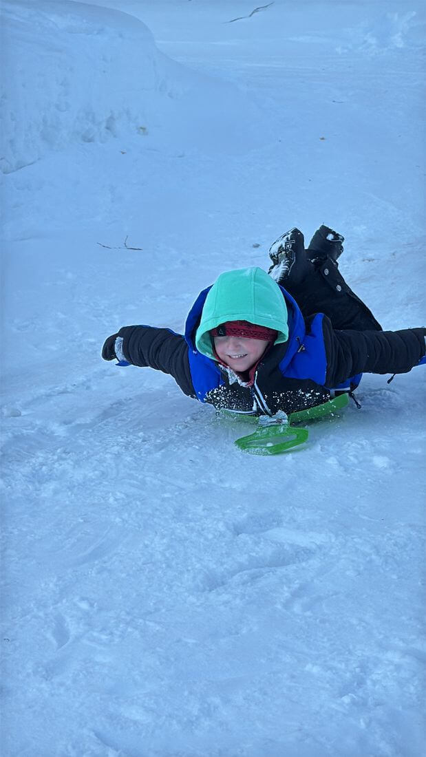 luge d'hiver Voyager avec des enfants au Canada